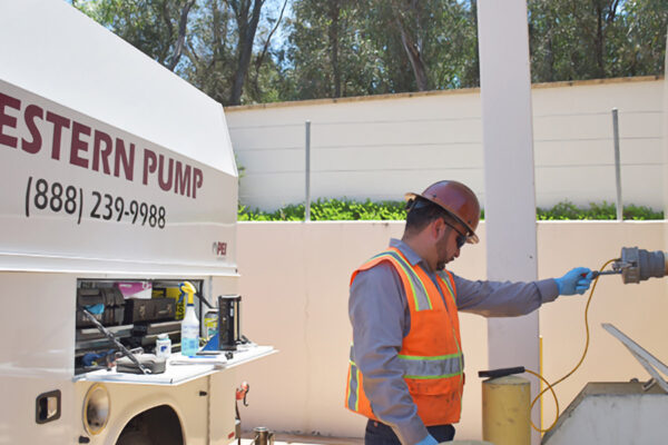 Man checking a pump.