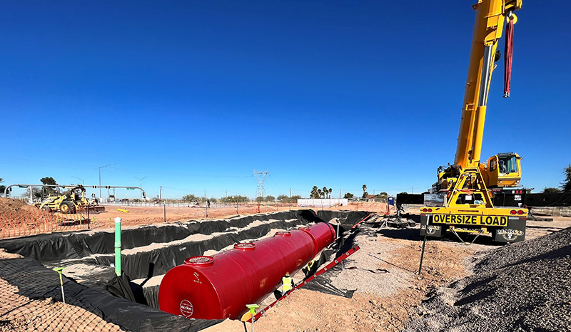 Underground fuel tank installation in a construction project
