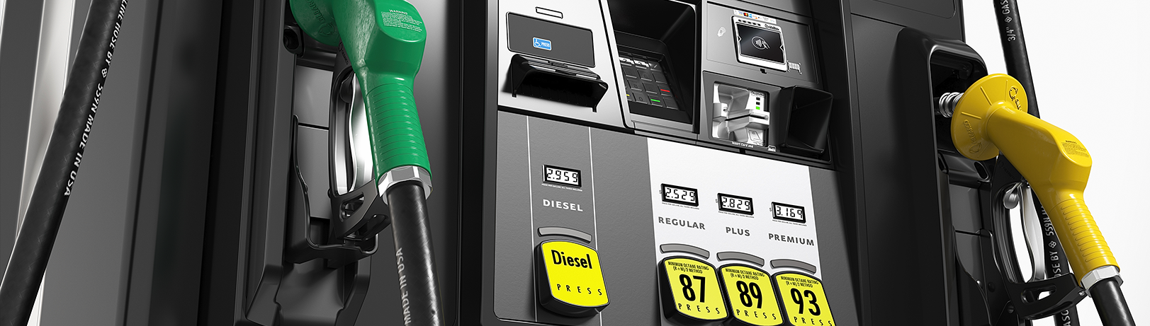 Close-up of a black fuel dispenser with green and yellow nozzles, digital price displays for diesel, regular, plus, and premium fuel options, and payment terminals.